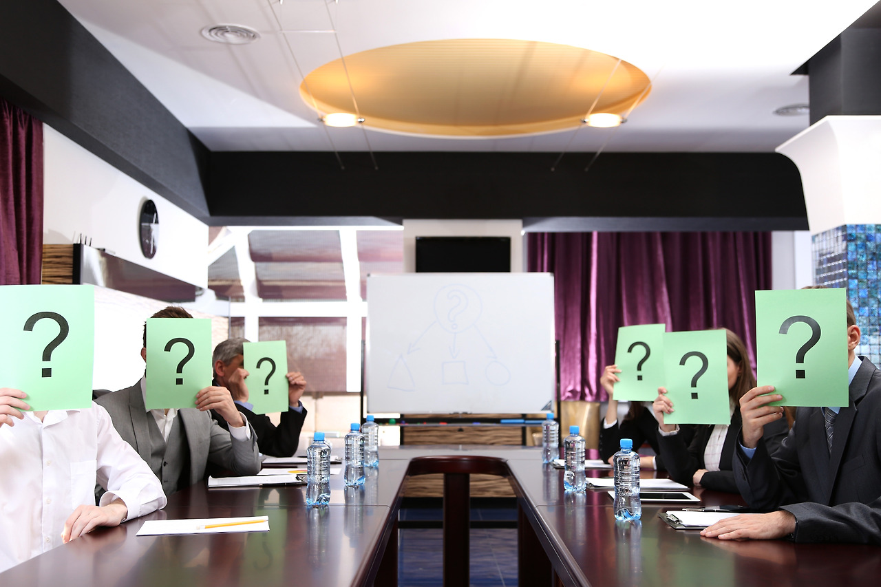 businessmen-with-question-marks-their-faces-before-business-training.jpg